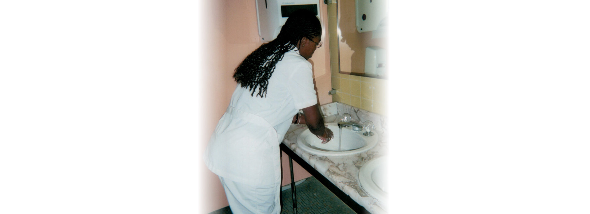 female nurse washing hands